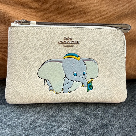 Coach Handbags - Coach x Disney Dumbo Wristlet